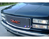 94-99 Chevrolet CK1500 Pickup w/ Composite Plastic Lights, 94-99 GMC Suburban w/ Composite Plastic Lights, 94-99 Yukon w/ Composite Plastic Lights APS Bolt-Over Grilles - Aluminum w/ Logo Opening