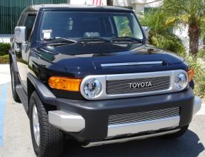 2007-2012 Toyota FJ Cruiser T-Rex Billet Grille Overlay/Bolt On With logo Opening (12 Bars) 